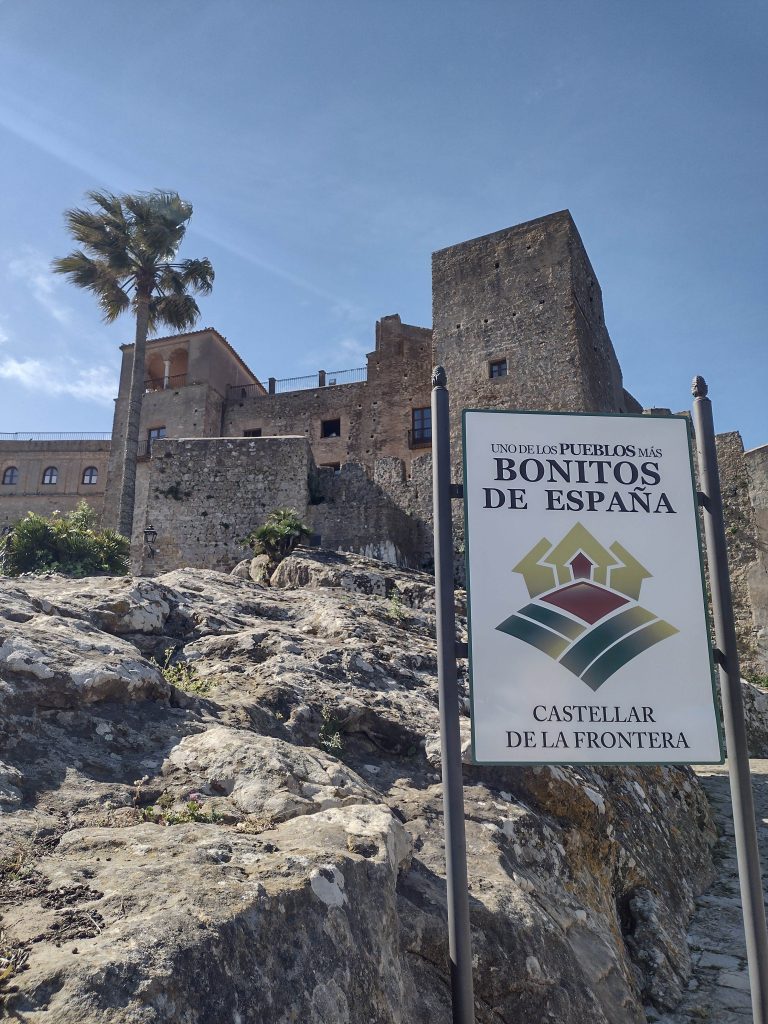 a view of the medieval castle in the village of Castellar de la Frontera